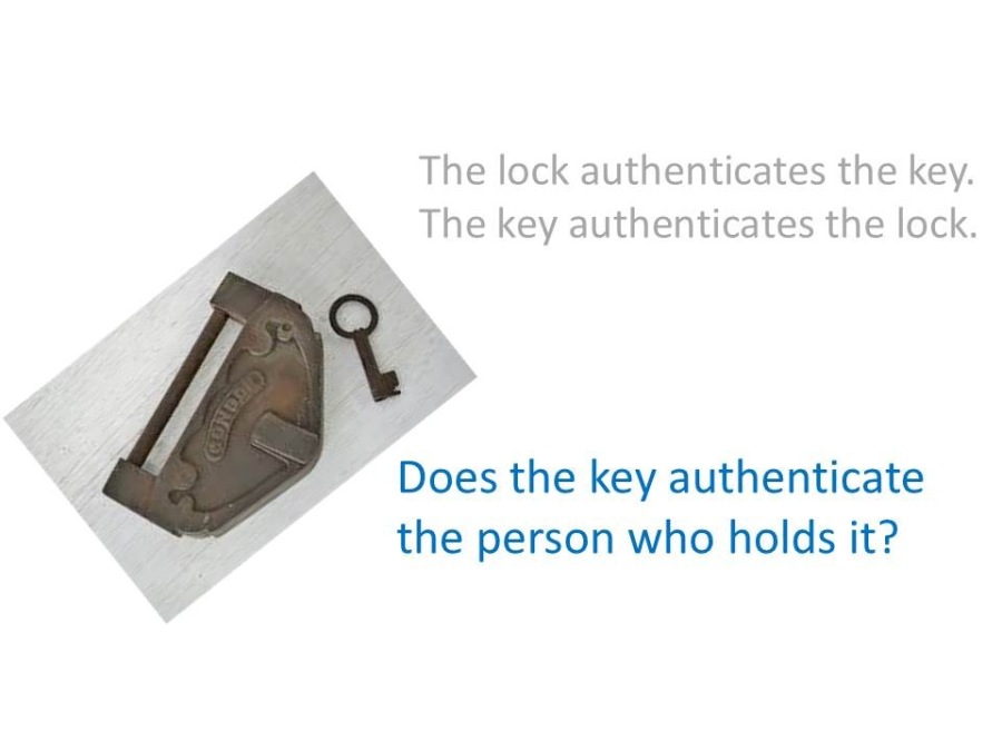 he lock authenticates the key.
The key authenticates the lock.

  

Does the key authenticate
the person who holds it?