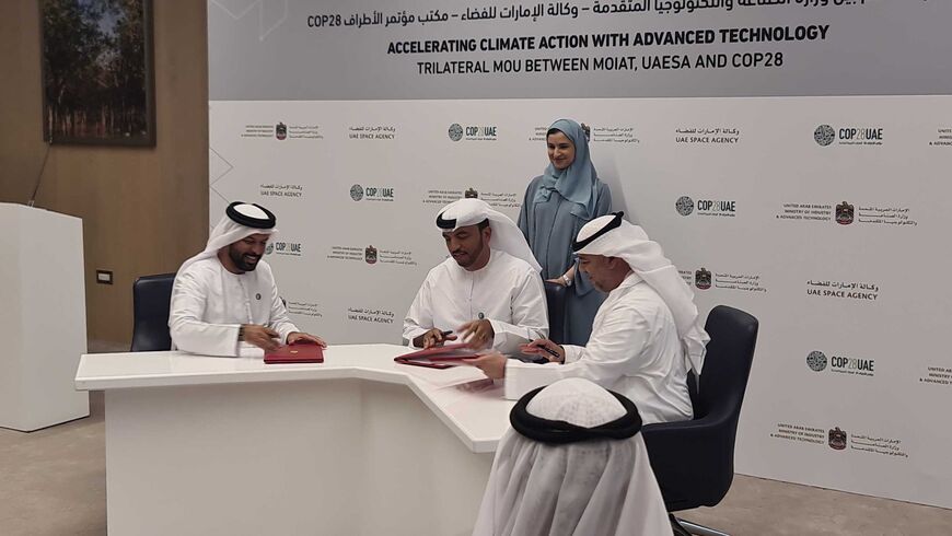 Undersecretary of the Ministry and Advanced Technology Omar Al Suwaidi (center), Director General of the UAE Space Agency Salem Butti Salem Al Qubaisi (left), and Director-General and Special Representative of the COP28 Majid Al Suwaidi (right) at the signing of an MoU between the three agencies. - COP28 Ub jai is - diall Cade fl 3g - An2LATRRRREREEEEEE

ACCELERATING CLIMATE ACTION WITH ADVANCED TECHNOLOGY
TRILATERAL MOU BETWEEN MOIAT, UAESA AND COP28

 
  

[La
