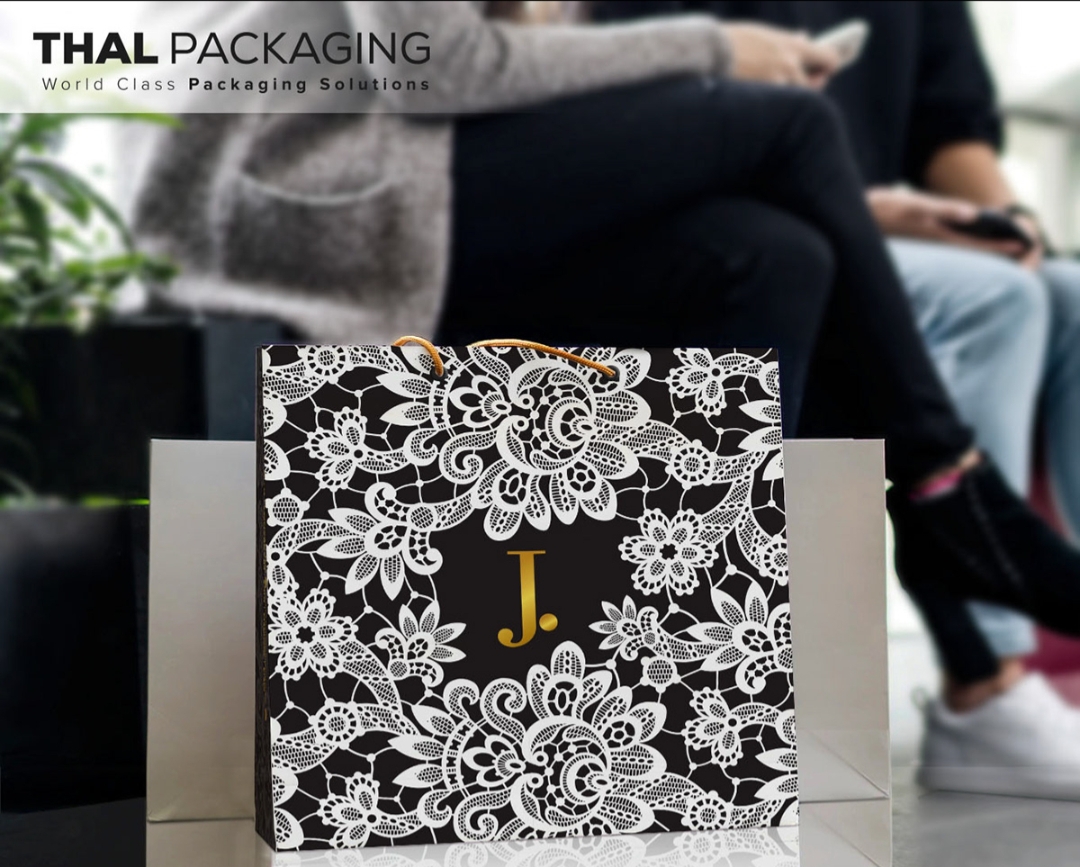 THAL PACKER 0)

Packaging J